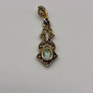Elegant Gold and Silver Pendant